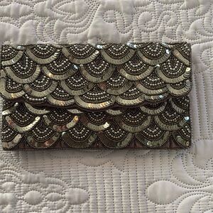 Picture does no justice at all beautiful gold sparkling clutch